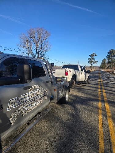Johnny's Automotive & Diesel Repair and Platinum Towing